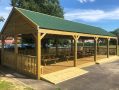 Large bespoke rectangular playground shelter and picnic area